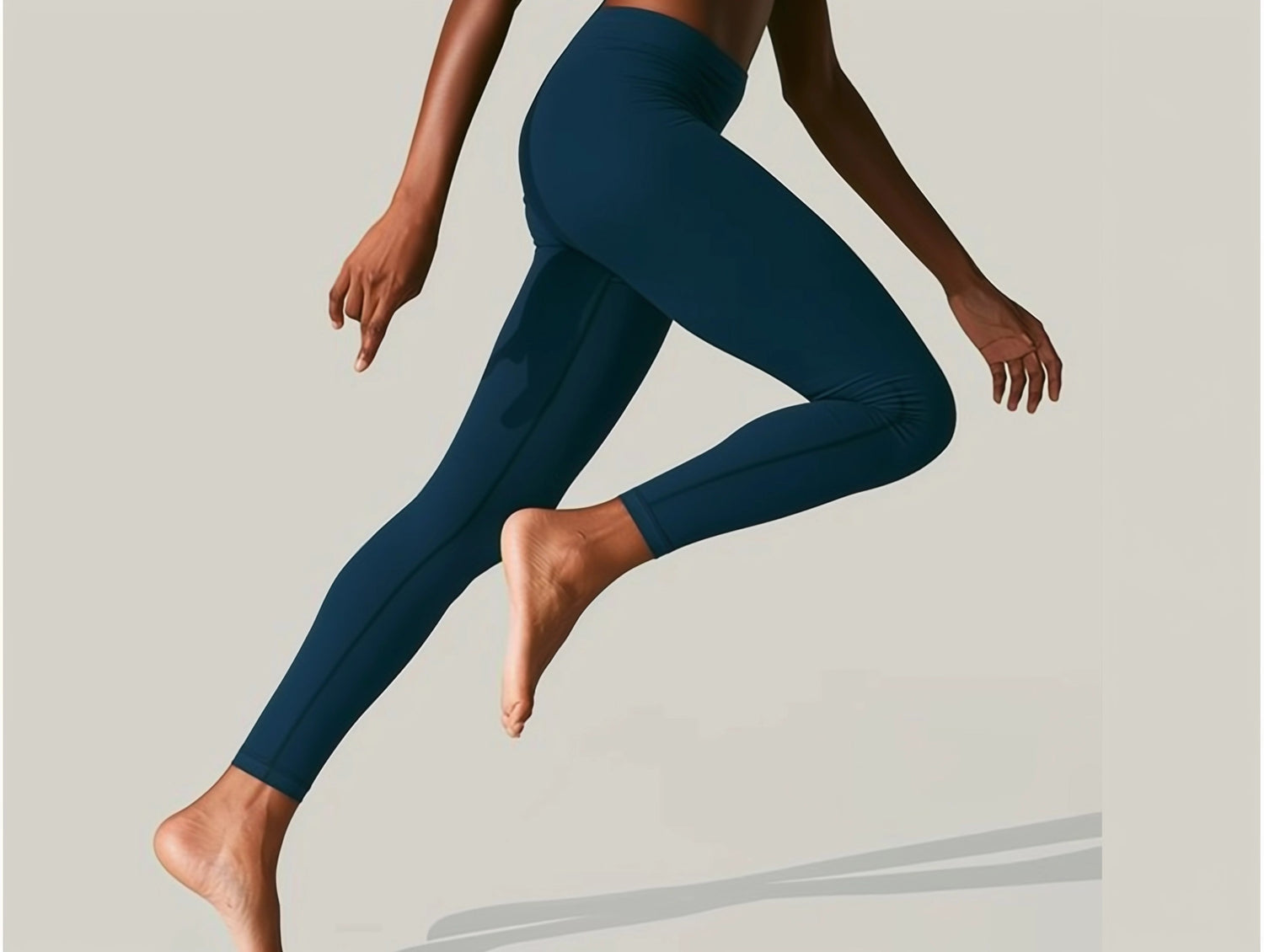 Model wearing leggings and a running position..